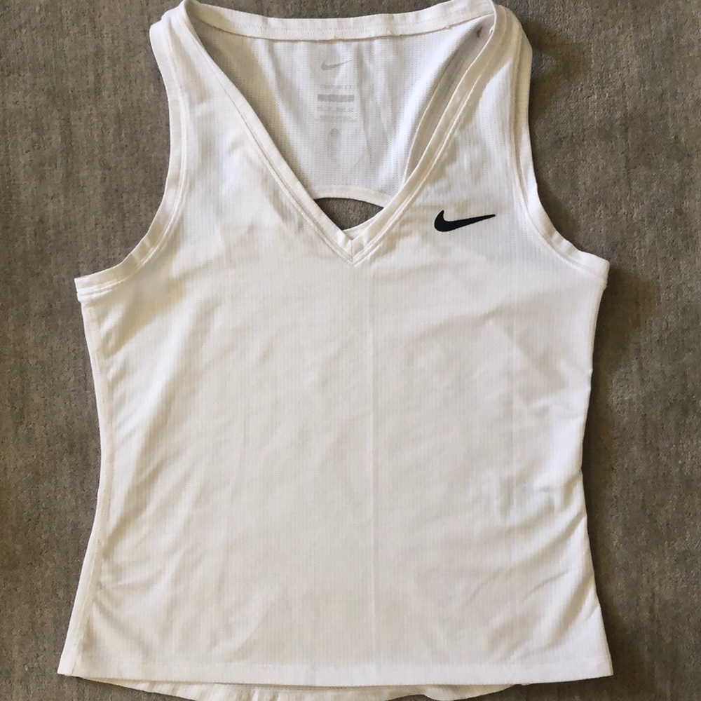 Nike white running shirt size xsmall.